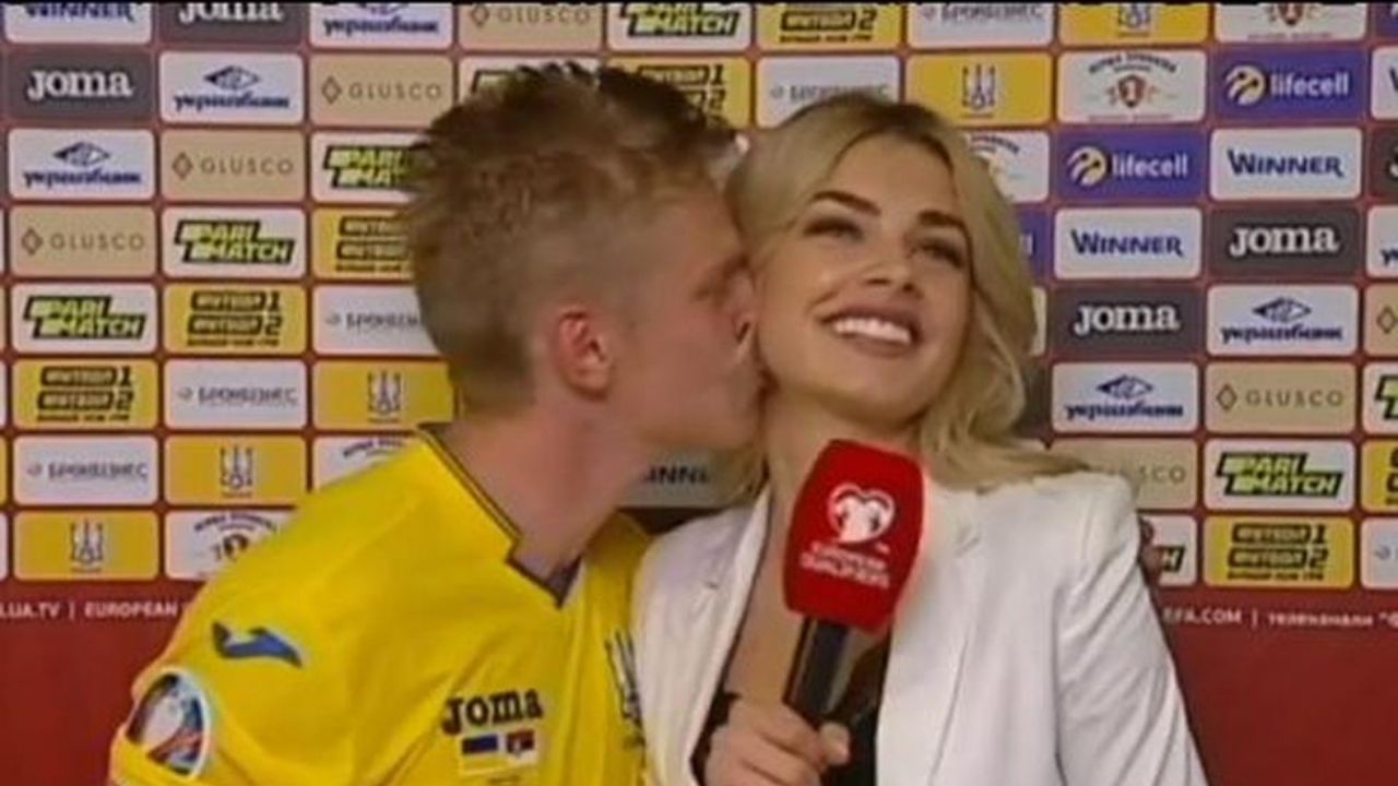 Jugador ucraniano no se contuvo y llenó de besos a su esposa mientras esperaba entrevista